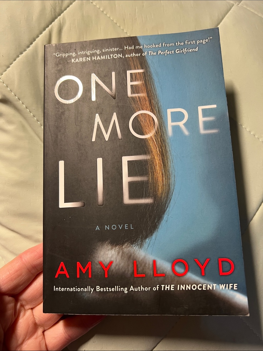 One More Lie by Amy Lloyd - Paperback Novel (Black, Blue, Red)